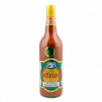 Bottle of hot sauce with a colorful label on a white background