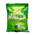 Green packet of Halls candy on a white background