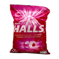 Halls raspberry flavored center-filled candy package on a white background