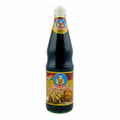 Bottle of mushroom soy sauce with a white background