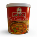 Container of Mae Ploy Red Curry Paste on a white background