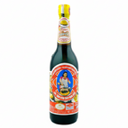 Bottle of sauce with a colorful label on a white background