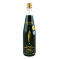 Bottle of Megachef premium fish sauce on a white background