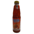 Bottle of sweetened chili sauce on a white background