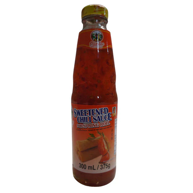 Bottle of sweetened chili sauce on a white background