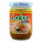Jar of Por Kwan Laksa Paste with colorful label on a white background