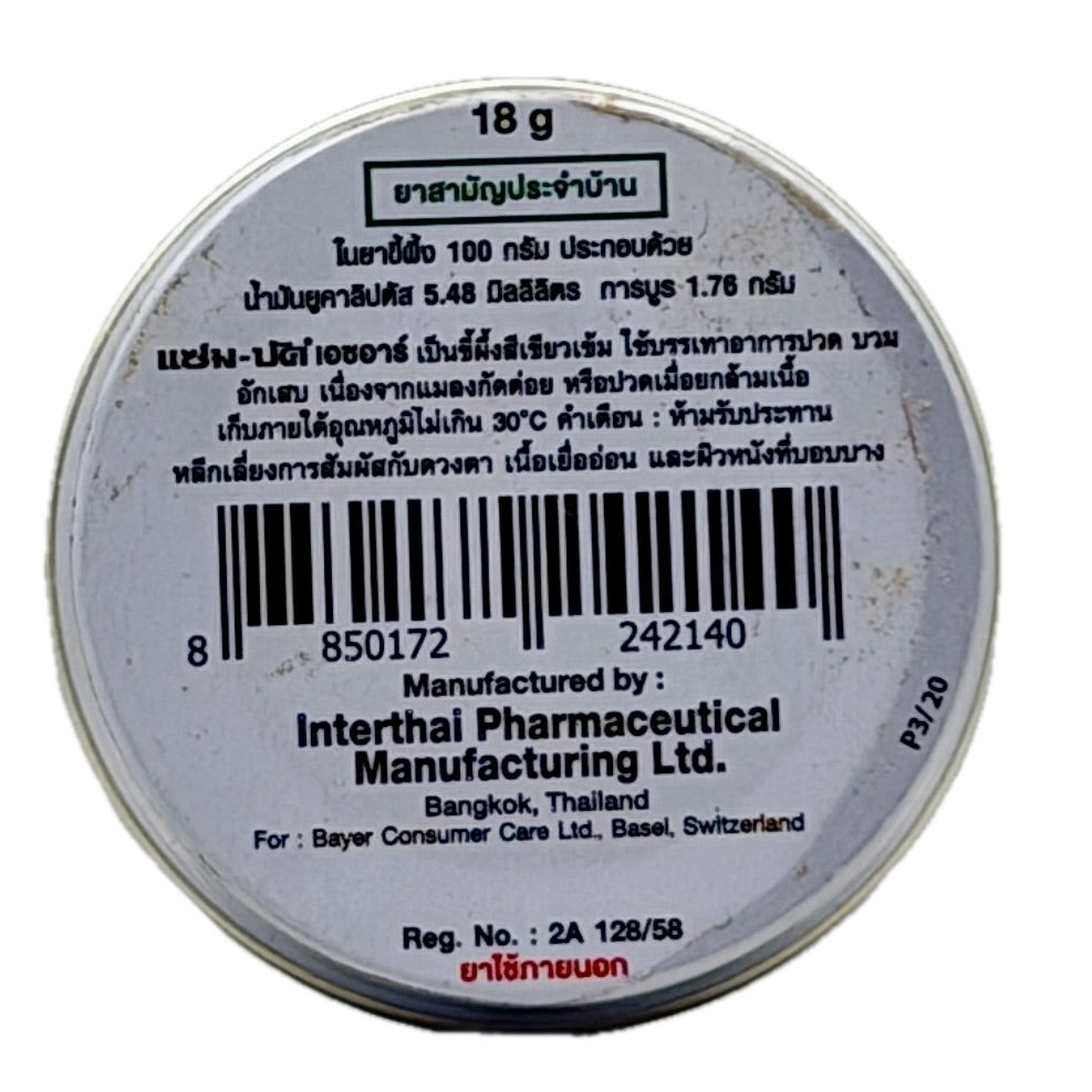 Bayer Zam-Buk herbal ointment tin base with Thai label showing 18g net weight and manufacturer details