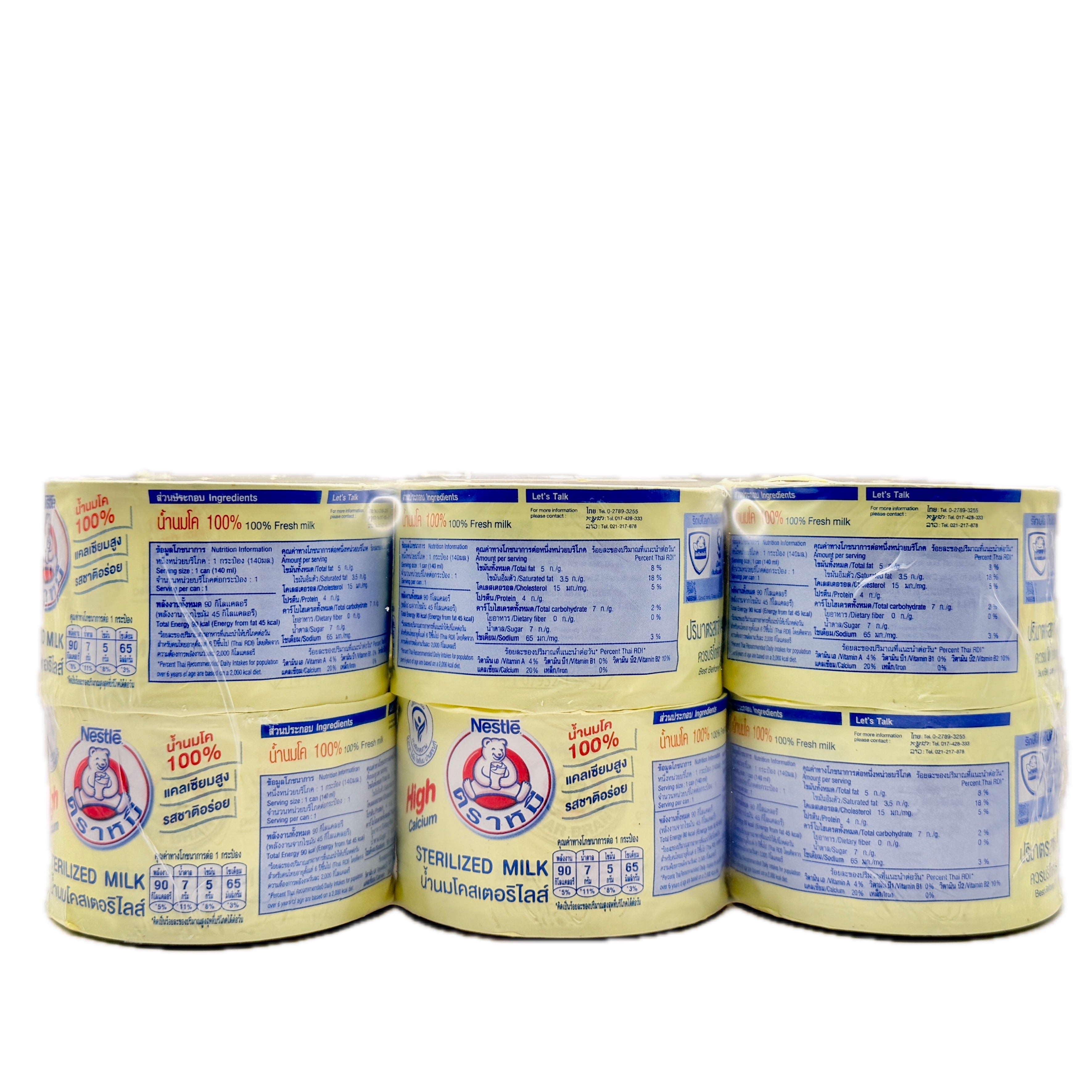 Bear Brand Sterilized Milk 6 pack tops viewed from above with nutrition sticker