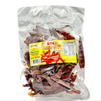 Packaged dried chilies with a yellow label on a white background