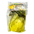 Packaged pickled mustard on a white background