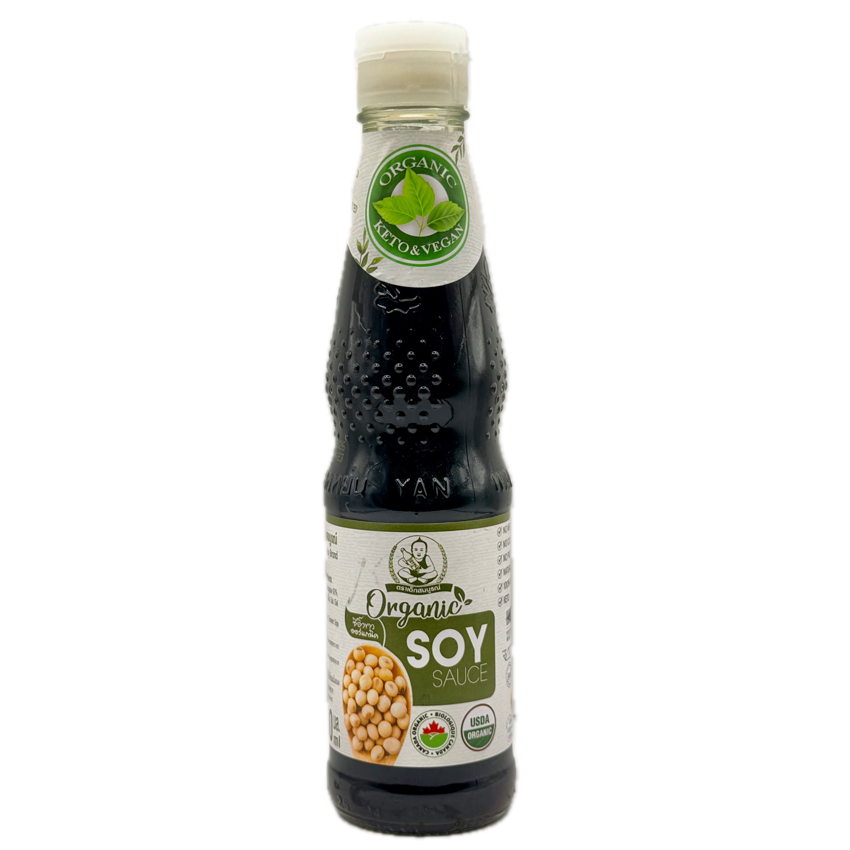 Dek Som Boon organic soy sauce bottle with organic keto and vegan seal front label on white background