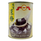 Goldfish Brand Grass Jelly 540g can with yellow and green label showing black jelly cubes on a spoon