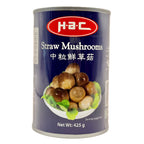 HAC Straw Mushrooms 425g dark blue can showing whole straw mushrooms on a serving plate