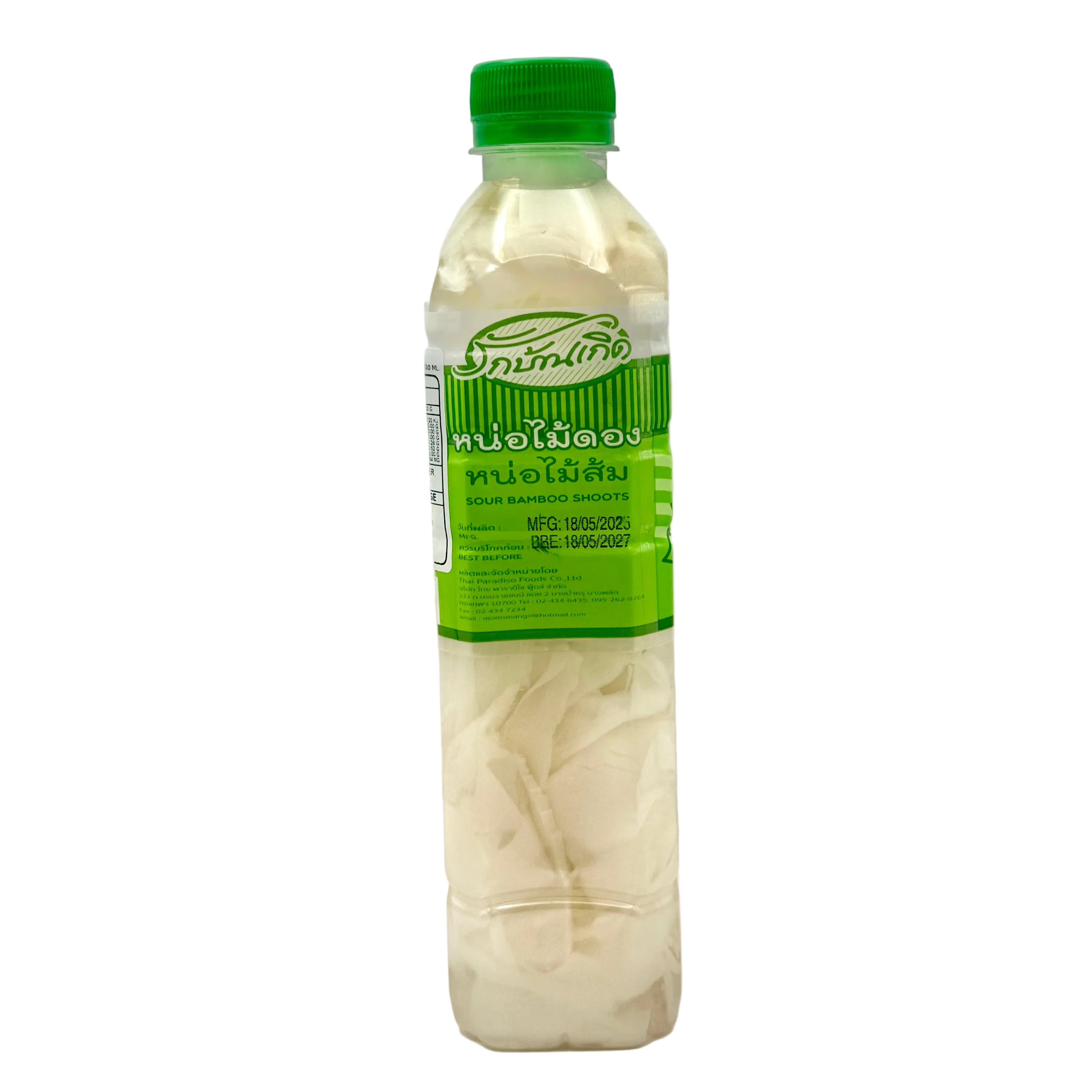 Bottle of milk with a green label on a white background