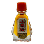 Siang Pure Oil Formula I traditional Thai herbal oil in small bell-shaped glass bottle with red cap