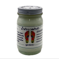 Jar of cream with a label on a white background